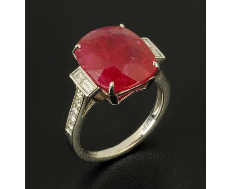 An 18 ct white gold ruby and diamond ring, ruby 5.64 carats, ring size K (see illustration).