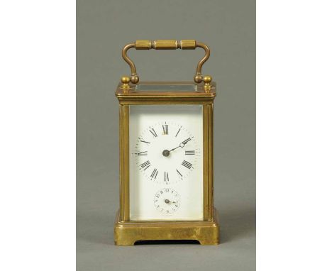 A French brass carriage clock, with alarm, single-train movement stamped "D.H.".  Height excluding carrying handle 4.5 ins, 9