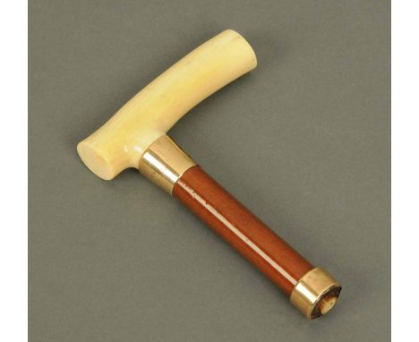 A gold mounted ivory walking stick handle, signed "Sangster", 9 ct gold hallmarked.  