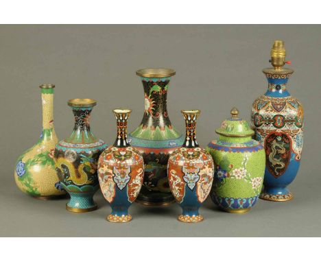 Seven Cloisonne vases, comprising a pair and five others, one converted to a table lamp.