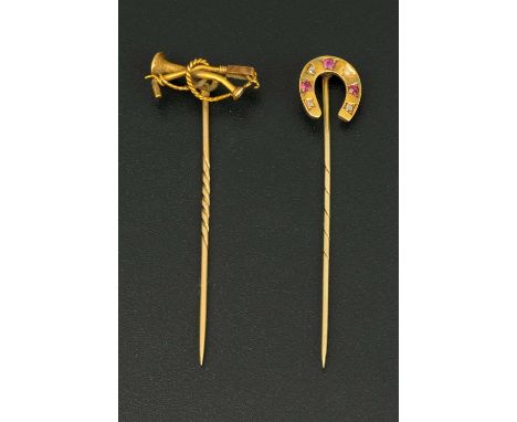 Two 9 ct gold stick pins, hunting interest, horseshoe, whip and horn, one cased.  