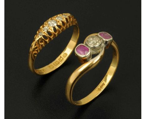 An 18 ct gold diamond ring, size L, and an 18 ct gold, ruby and diamond set crossover ring, size O.  CONDITION REPORT: The co