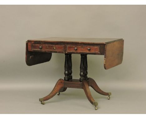 A Regency rosewood sofa table, with brass inlay to two drawers, 92cm wide