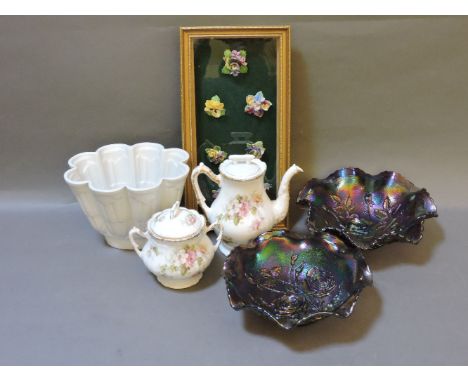 Two carnival glass bowls, a frame of seven ceramic flower brooches, a Shelley jelly mould and a Limoges coffee pot and sugar 