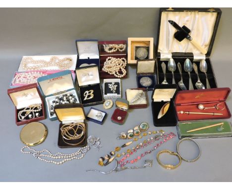 A later Victorian graduated crossover silver bracelet, a ladies' gold plated Tissot mechanical bracelet watch, a pair of 9ct 