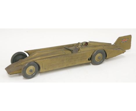 A Gunthermann tinplate clockwork model, of 'The Golden Arrow' land speed record car, 1929, the tail fin mounted with a Union 