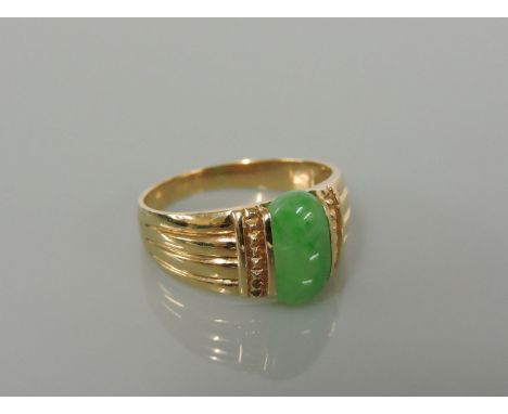 A gold single stone jade ring, ignore markings, tested as approximately 14ct gold, 3.72g