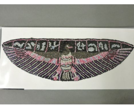 A Native American beaded panel, decorated with a bald eagle, 28cm long