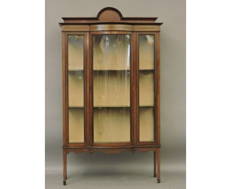 An Edwardian bow front display cabinet 115cm wide