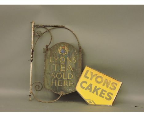 Two old enamel double-sided advertising signs, the first with wrought iron bracket, 'Lyons Tea Sold Here', 90cm high, the sec