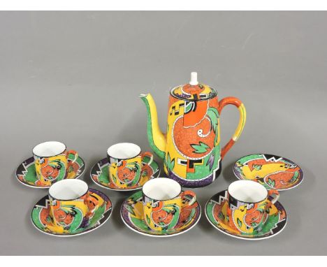 A Staffordshire earthenware coffee set, c.1920, chrome lithographically printed in bright colours in the style of Clarice Cli