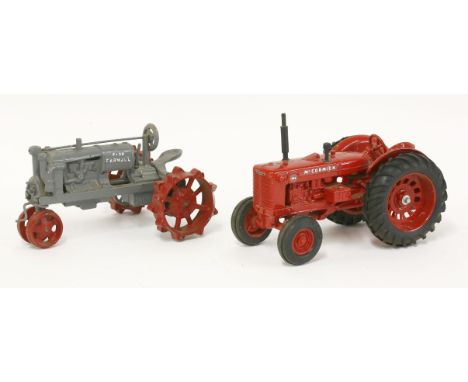 Two model tractors: a Farmall F-30 farm tractor, and McCormick, WD-9 (2)