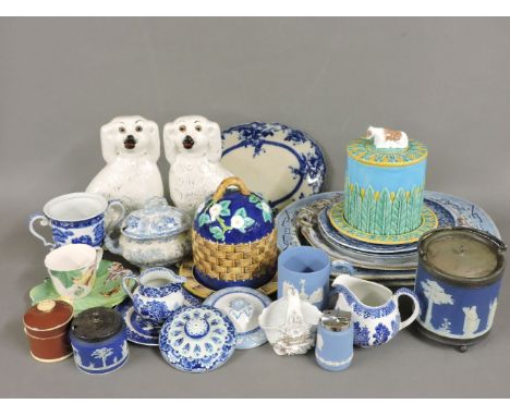 A collection of blue and white transfer printed pottery, to include Spode, meat plates and others, and two majolica type chee