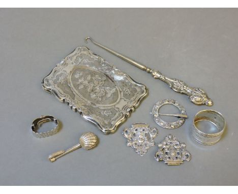 A Victorian silver card case, Birmingham 1857; a silver brooch, by John Grinsell & Sons, Birmingham 1935; a silver buckle, a 