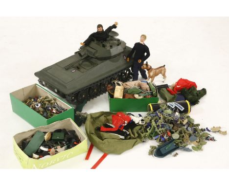 A collection of Action Man items, figures, clothing, accessories, and an Avis Scimitar tank