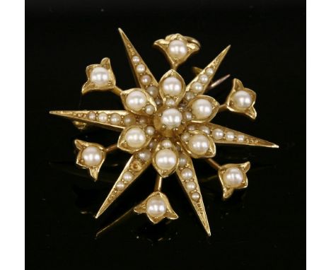 A late Victorian gold split pearl starburst brooch/pendant, with detachable brooch fitting, tested as approximately 15ct gold