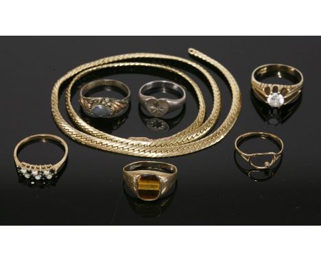 A 9ct gold herringbone chain, no clasp, four 9ct gold rings, and two rings, 14.70g