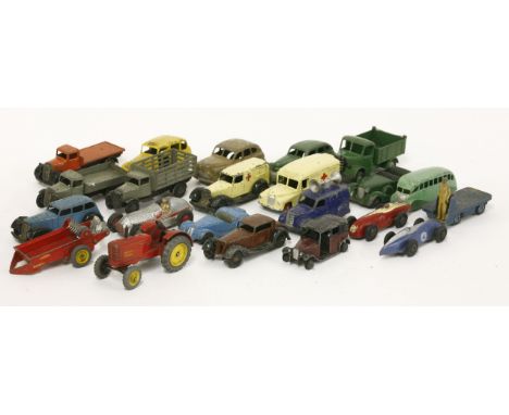 A collection of playworn die-cast toys, including cars, trucks, farm machinery, Dinky, an MG Record car, Crescent toys, Brita