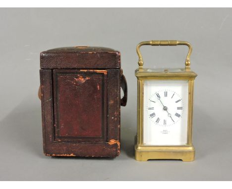 A Dent of London carriage clock, with white enamel face and repeater movement, in leather case