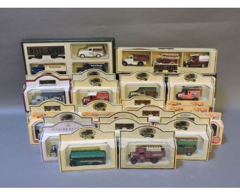 A collection of Lledo 'Days Gone' die-cast toys, boxed, other mixed toys, a building set, and a Triang engine shed, boxed