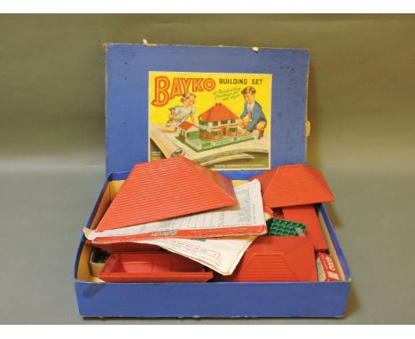 A Bayko '2' building set, together with a stamp collector's stock book containing a number of European and world stamps.