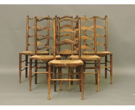 A set of six ladder back rush seated chairs