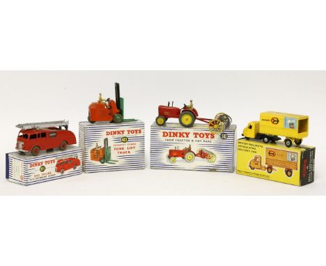 Three Dinky toys (310), farm tractor and hayrake (410), forklift truck (955), fire engine, boxed, and a Budgie (238) British 
