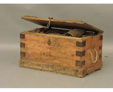 A 19th century carpenter's chest with woodworking tools, including 40 moulding planes, chisels, draw knives and a roll of ste