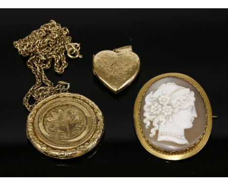A 9ct gold locket and chain, a 9ct gold heart shaped locket, and a small cameo brooch, tested as approximately 9ct gold