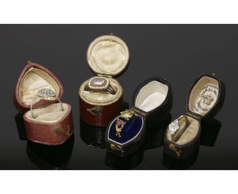 A Georgian gold and split pearl memorial ring, with an inscription dated 1831, an Art Deco diamond set lozenge shaped ring, a