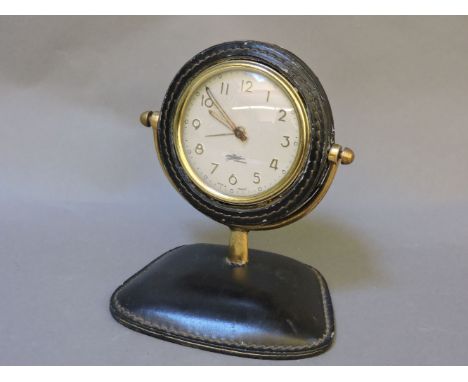 A Longchamp desk alarm clock