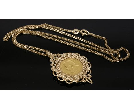 A half pond coin pendant, the coin dated 1895, in a 9ct gold pendant mount on a 9ct gold chain, 11.69g