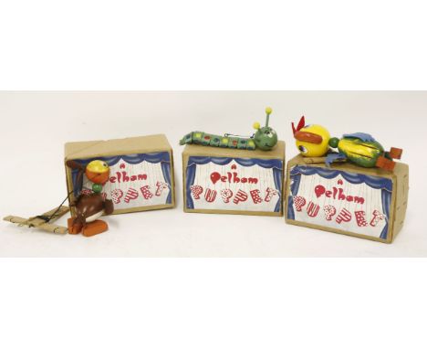 Three Pelham puppet animals, 'Caterpillar', 'Parrot', and 'Duck', in brown boxes (3)