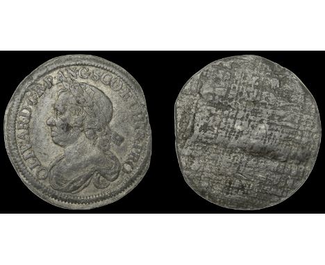 IV: Coins of Oliver Cromwell, Halfcrown, 1656, an obverse trial strike in lead, laureate bust left, olivar d g r p ang sco et