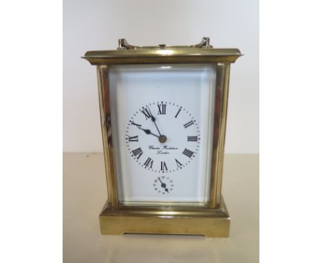 A French made brass carriage clock with repeat and alarm striking on a gong, the dial signed Charles Frodsham London - 16cm t