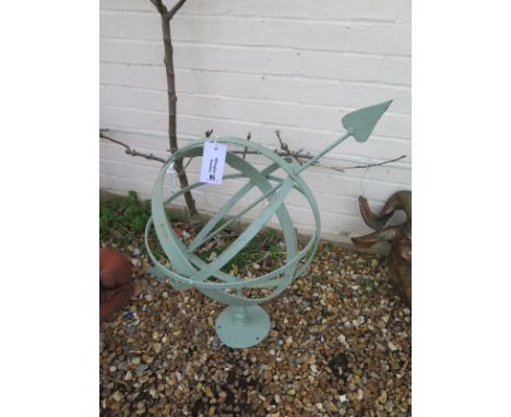 A hand forged wrought iron garden armillary sundial sphere with arrow, painted and distressed 
