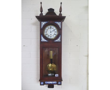 A walnut single weight Vienna wall clock with decorative panels, 90cm tall - clean condition, some cracks to dial, missing fi