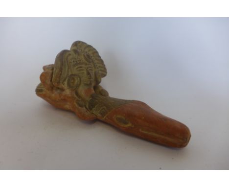 A Pre-Columbian or later pottery pipe in the form of a man riding a snake - 15cm long, overall good 