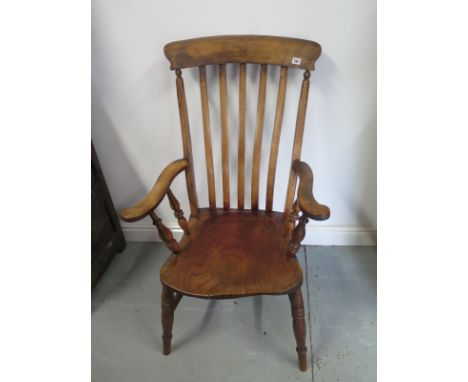 A Victorian stick back chair 