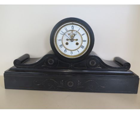 A black slate drum clock with exposed escapement with key and pendulum - 30cm tall x 55cm 