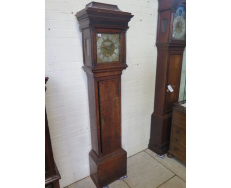 An 18th century oak 30 hour longcase clock with an 11 inch square brass dial signed Thos Thatcher Tenterden and bird cage mov