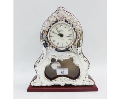 Contemporary silver fronted Cunill quartz mantle clock, 27cm high 