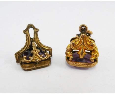 Two amethyst seal fobs, (2) 