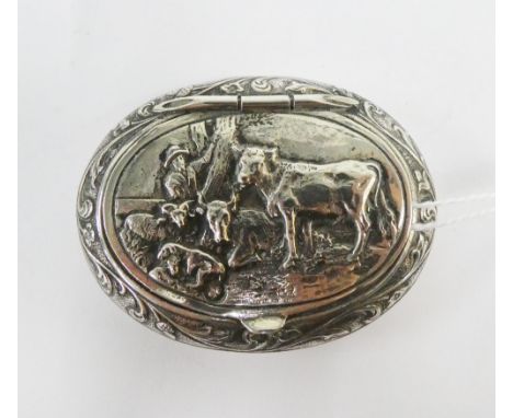 Continental silver pill / snuff box, the oval lid with cattle and a figure, 6cm 
