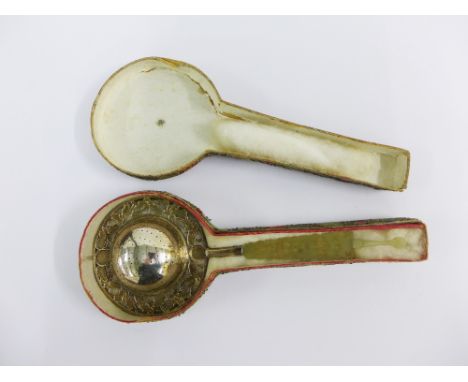 Chinese silver tea strainer, the pierced bowl with butterfly pattern border and with a carved jade handle, complete with orig