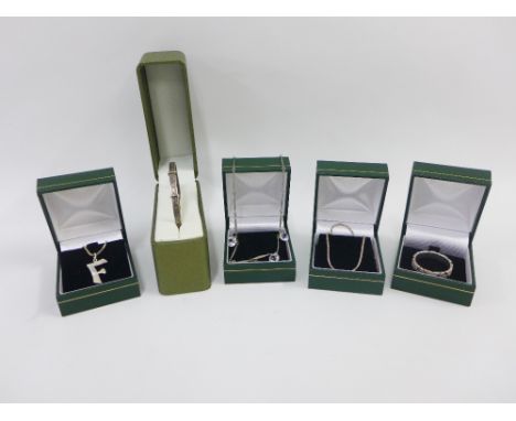 A collection of various silver and white metal jewellery to include necklaces, bangle and ring, etc (a lot) 