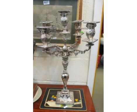 A large plated candelabra and other plated items