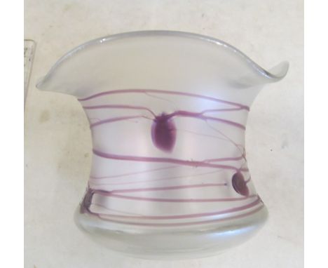 A Loetz style scent bottle with amethyst coloured swirls and a similar vase