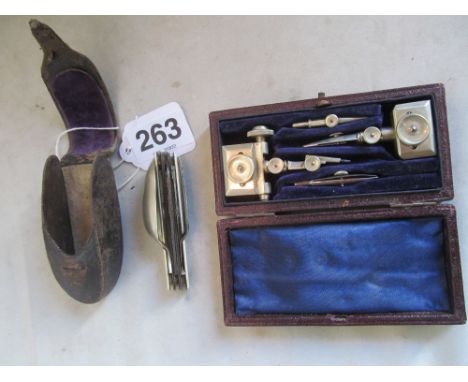 A penknife with fork and spoon (i.c) and a geometry set (i.c)