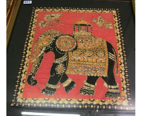 A needlework picture elephant and an elephant print